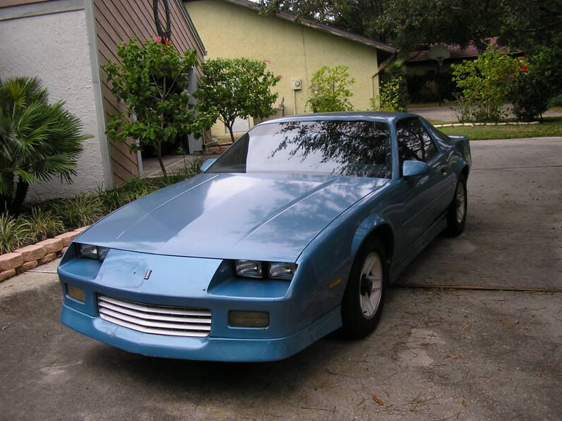 Hi I'm selling my 1991 Camaro RS baby blue paint job limo tint auto 