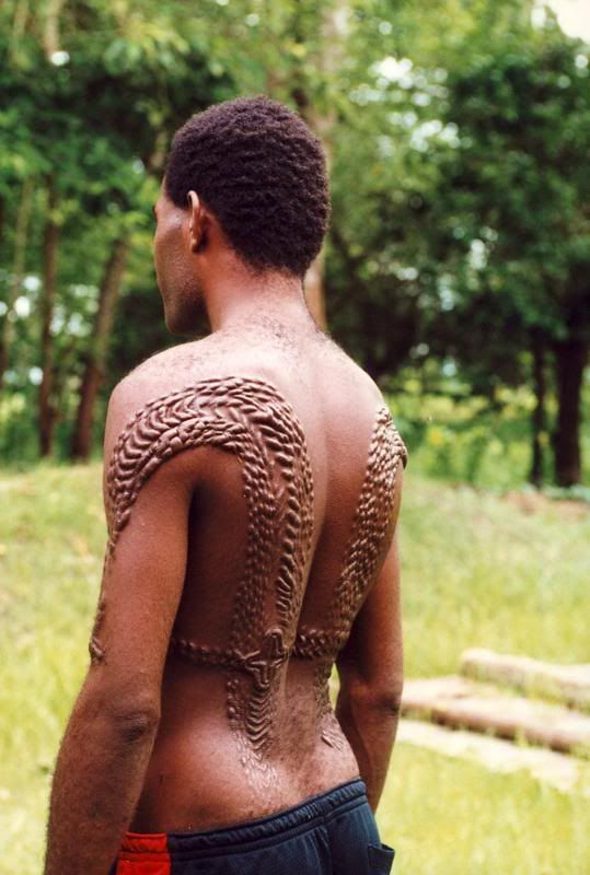 scarification tattoo. tattoos,scarification