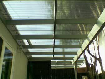 Caarport remodel using smoked polycarbonate roof