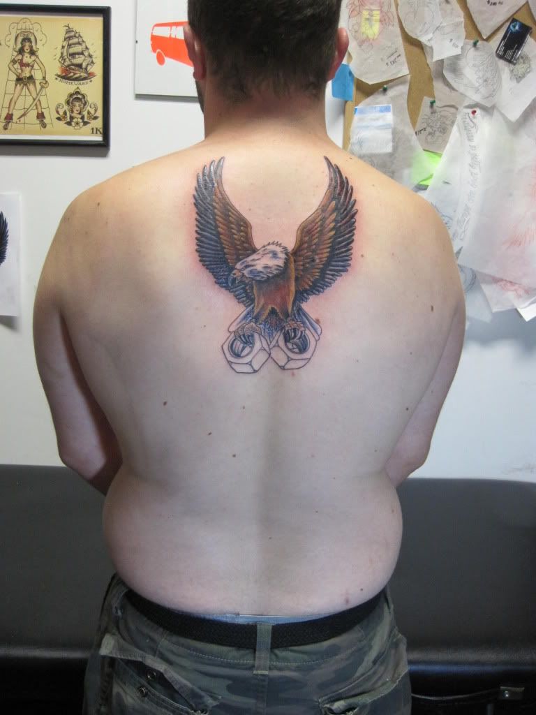 http://i51.photobucket.com/albums/f367/offroadzj/Tattoos/IMG_0729.jpg