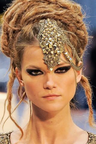  of dreads and metal accessories gave it an almost Steampunk look